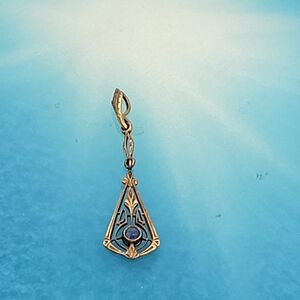Antique Art Nouveau 14k Yellow gold Lavalier Pendant with a Blue Sapphire